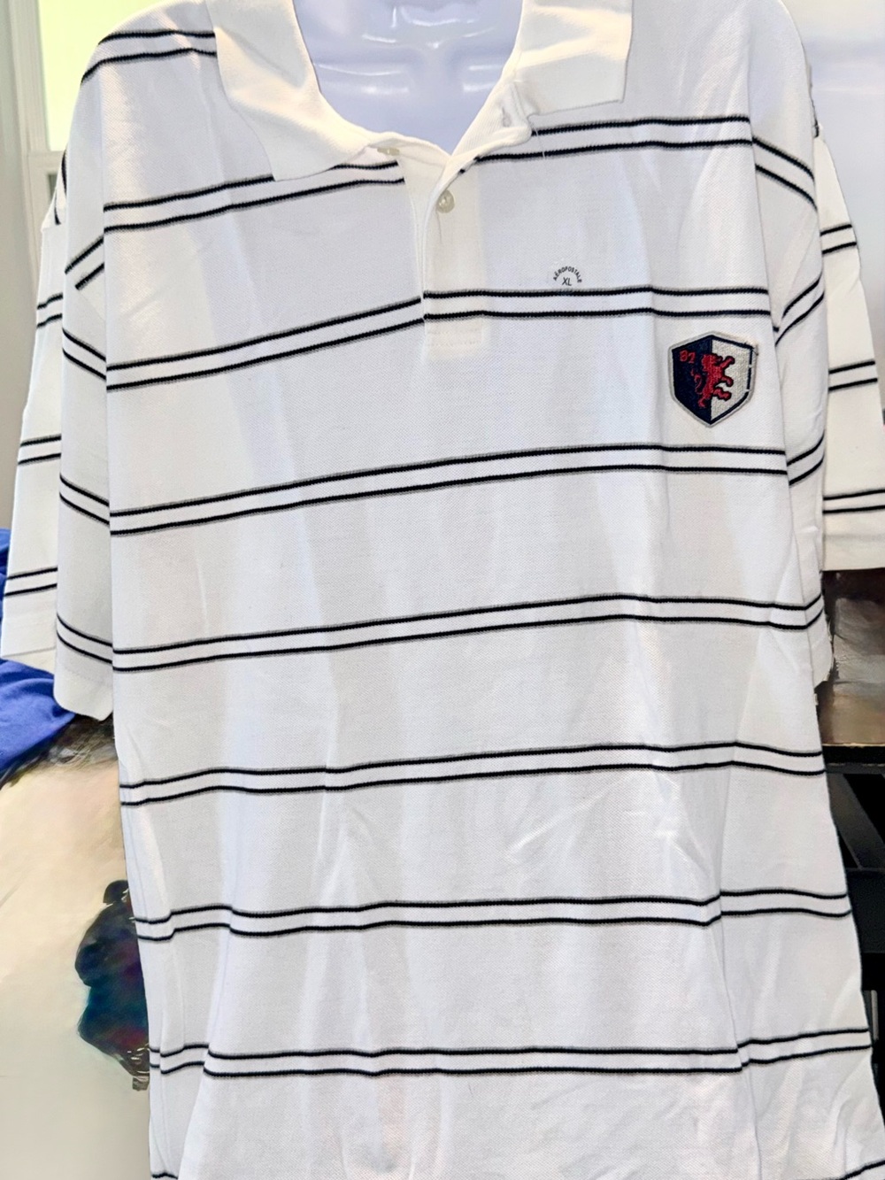 Aeropostale White Polo with Black Stripes and Crest Patch